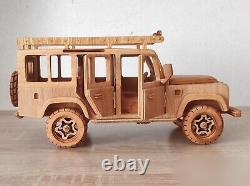 Special handmade wooden Land Rover Defender 110. Off-road diacast model car